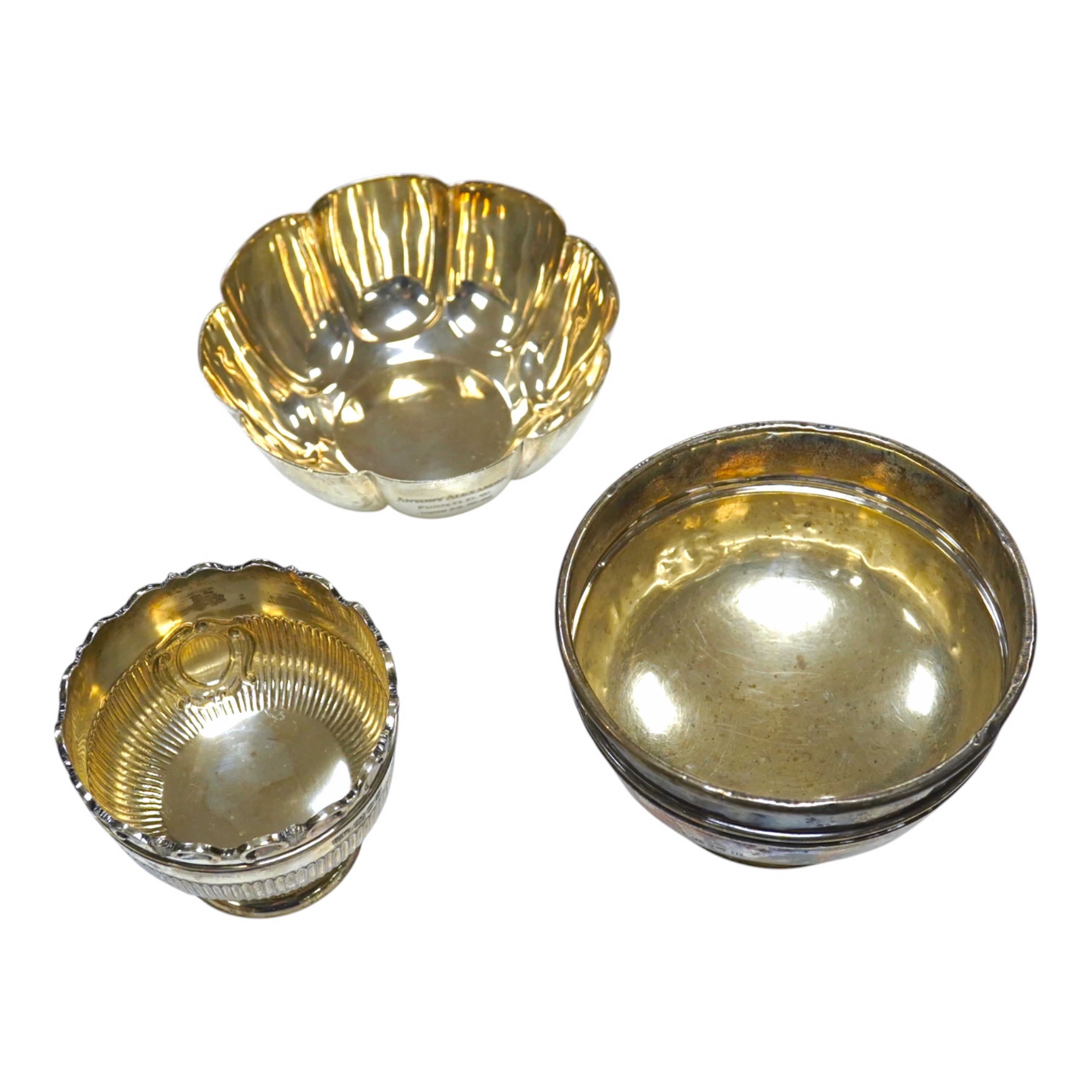 Three assorted small silver bowls including Edwardian cusped shape by Mappin & Webb, 13.6oz Condition - poor to fair